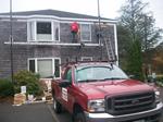 Installation of new white cedar shingles for law office in Chatham, MA